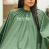 Customer wearing green Cali Collection Cape