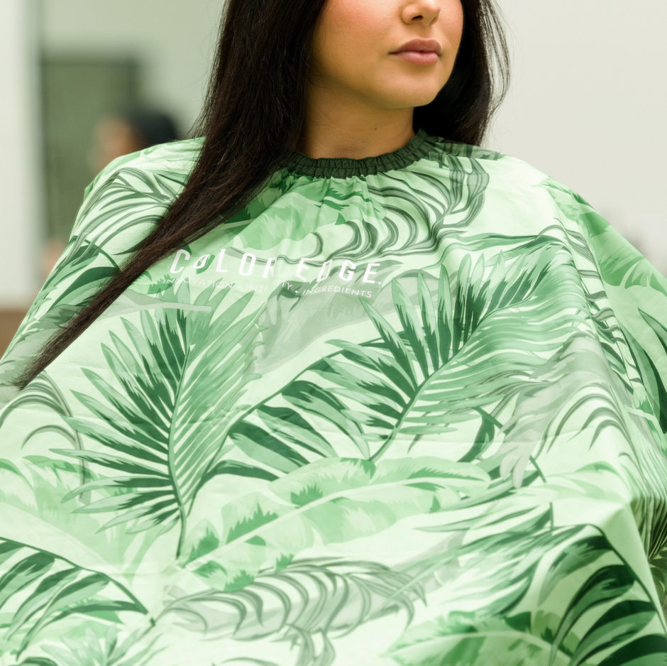 Customer wearing green palms Cali Collection Cape