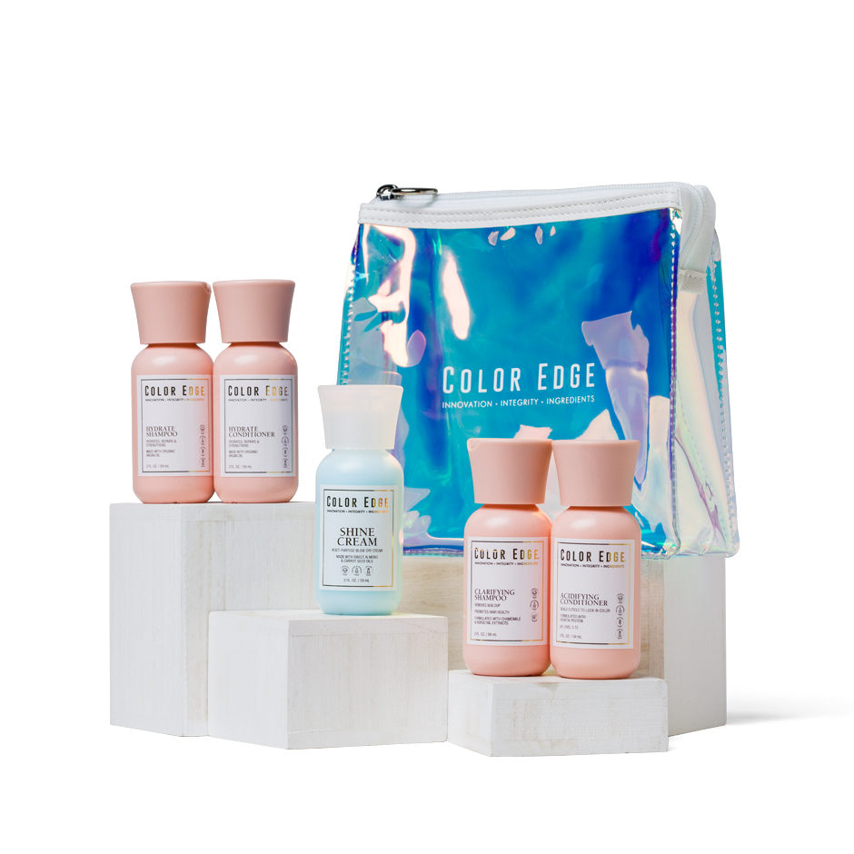 On The Move Travel bundle. Includes Cosmetic Pouch and 5 travel sized hair product bottles.